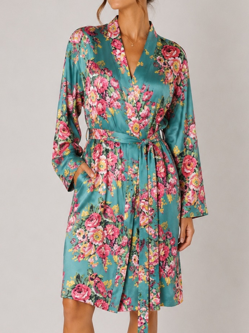 floral kimono-style robe vibrant teal background large pink and yellow blossoms